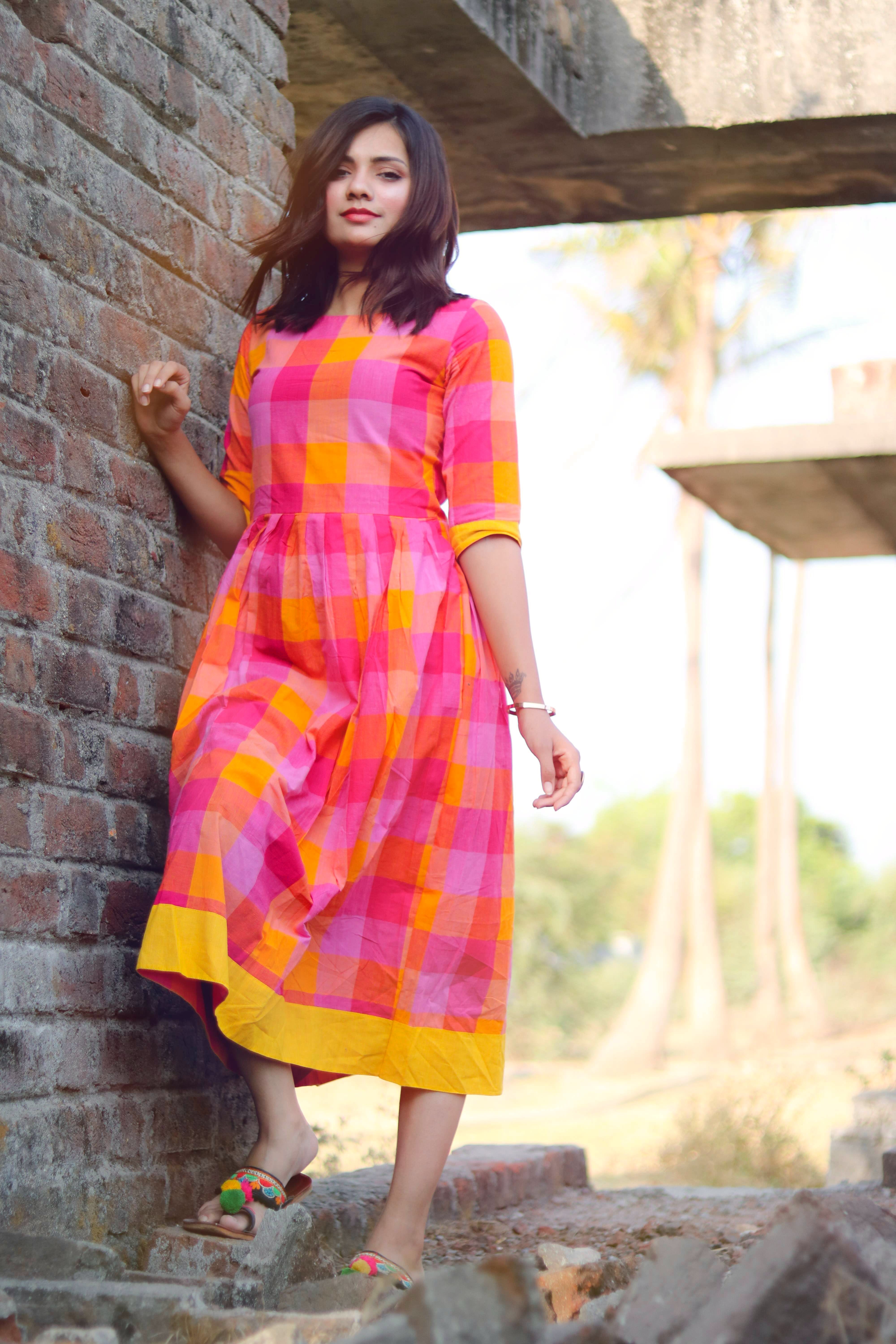 Clothing,Yellow,Dress,Day dress,Pink,Beauty,Orange,Fashion model,Fashion,Lady