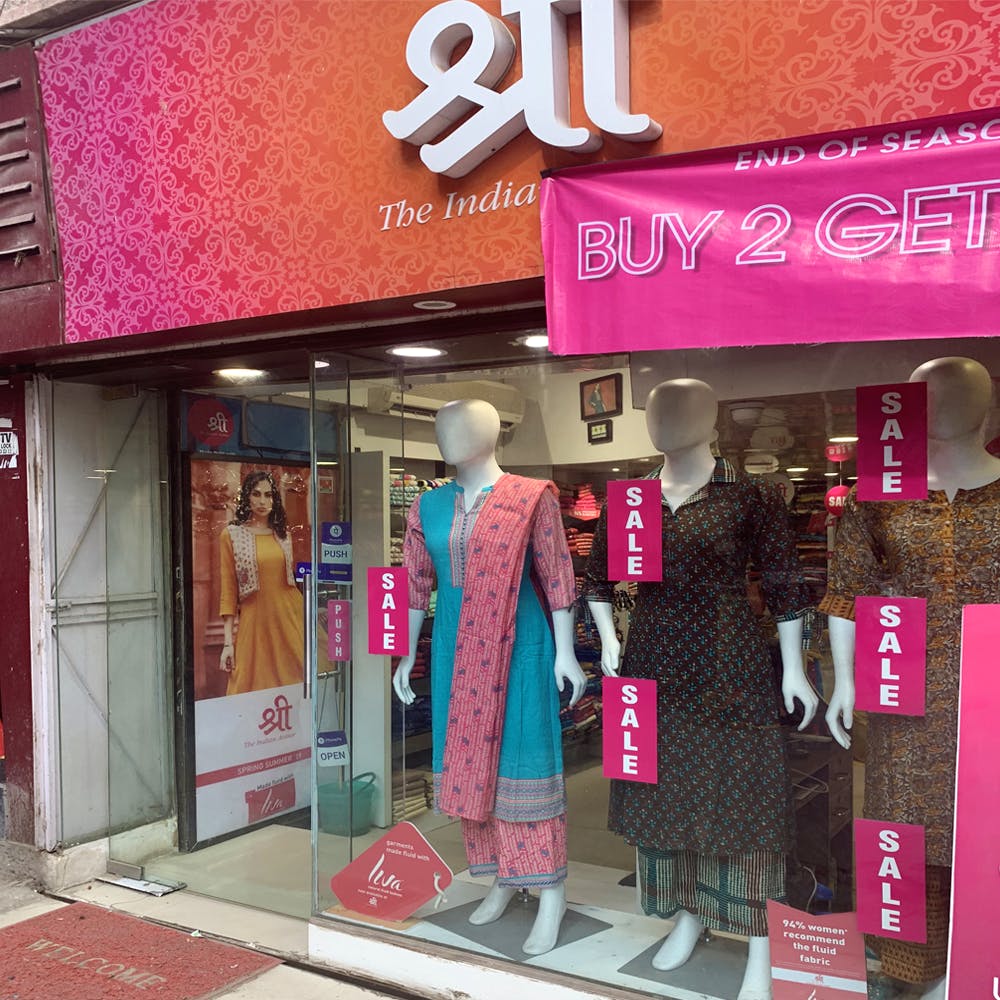 Pink,Boutique,Outlet store,Building,Display window,Retail,Window
