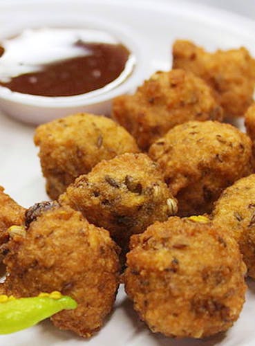 Dish,Food,Cuisine,Fried food,Ingredient,Prawn ball,Fast food,Pakora,Hushpuppy,Chicken nugget