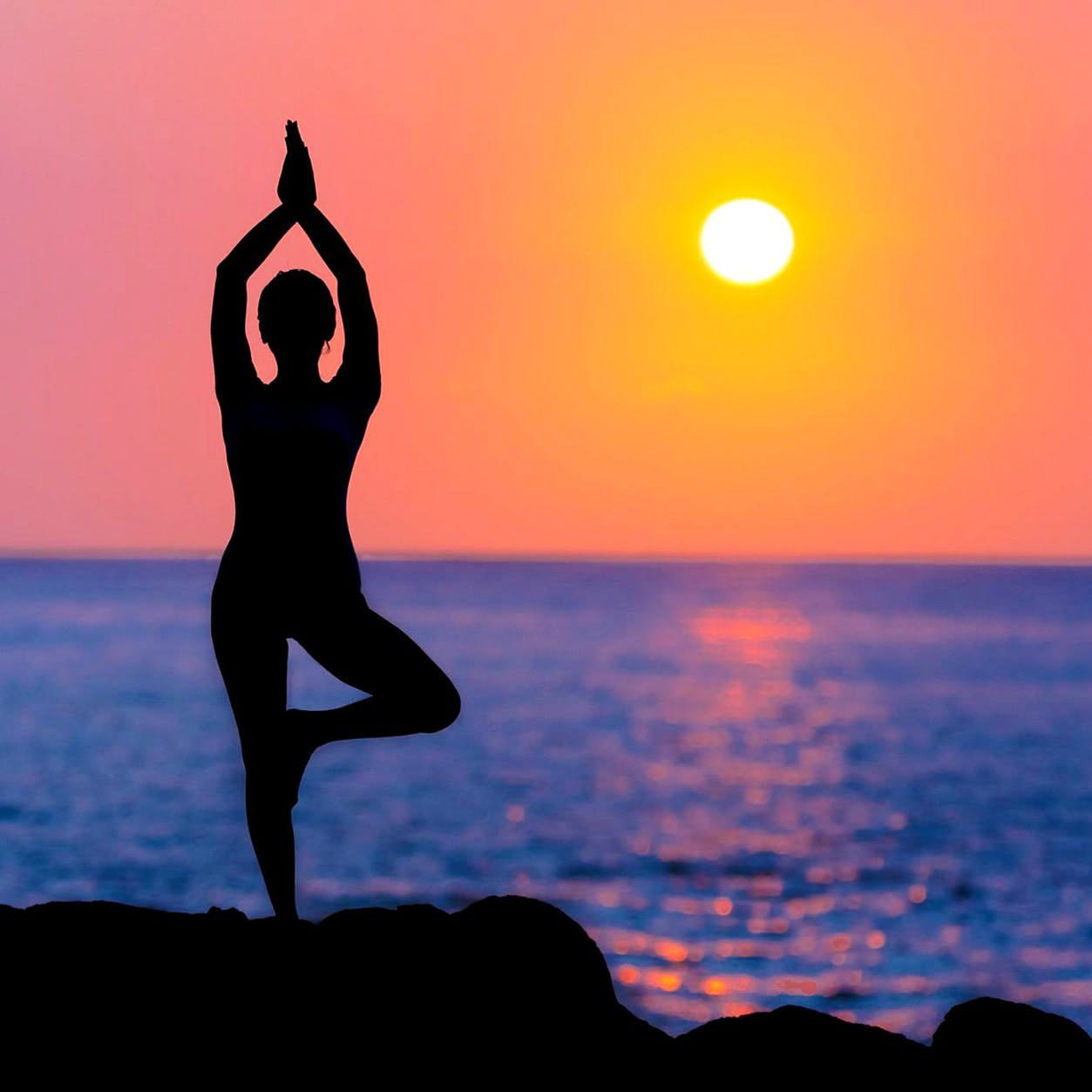 People in nature,Physical fitness,Yoga,Silhouette,Sky,Horizon,Beauty,Sunrise,Standing,Sunset