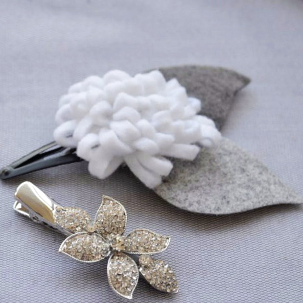 Leaf,Fashion accessory,Petal,Jewellery,Brooch,Flower,Hair accessory,Plant,Hydrangea