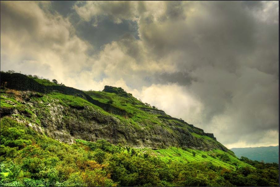 Sky,Nature,Vegetation,Natural landscape,Green,Highland,Mountainous landforms,Hill station,Cloud,Hill