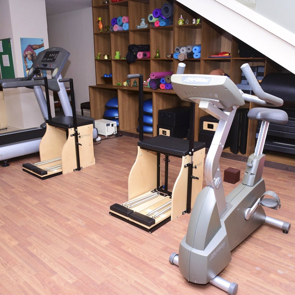 Gym,Room,Exercise equipment,Exercise machine,Flooring,Machine,Sport venue