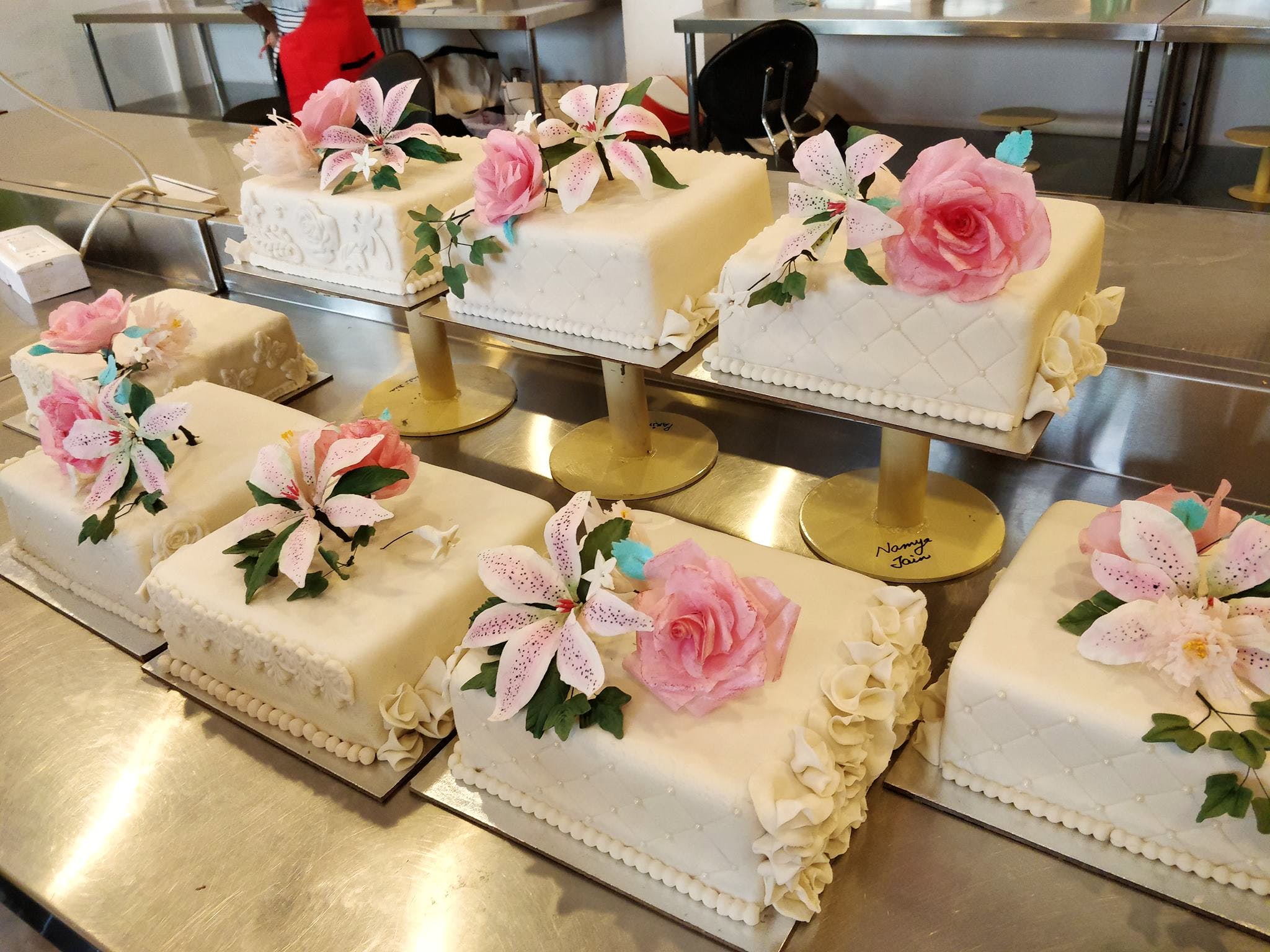 Pink,Artificial flower,Table,Flower,Textile,Tablecloth,Floristry,Plant,Cake decorating,Floral design
