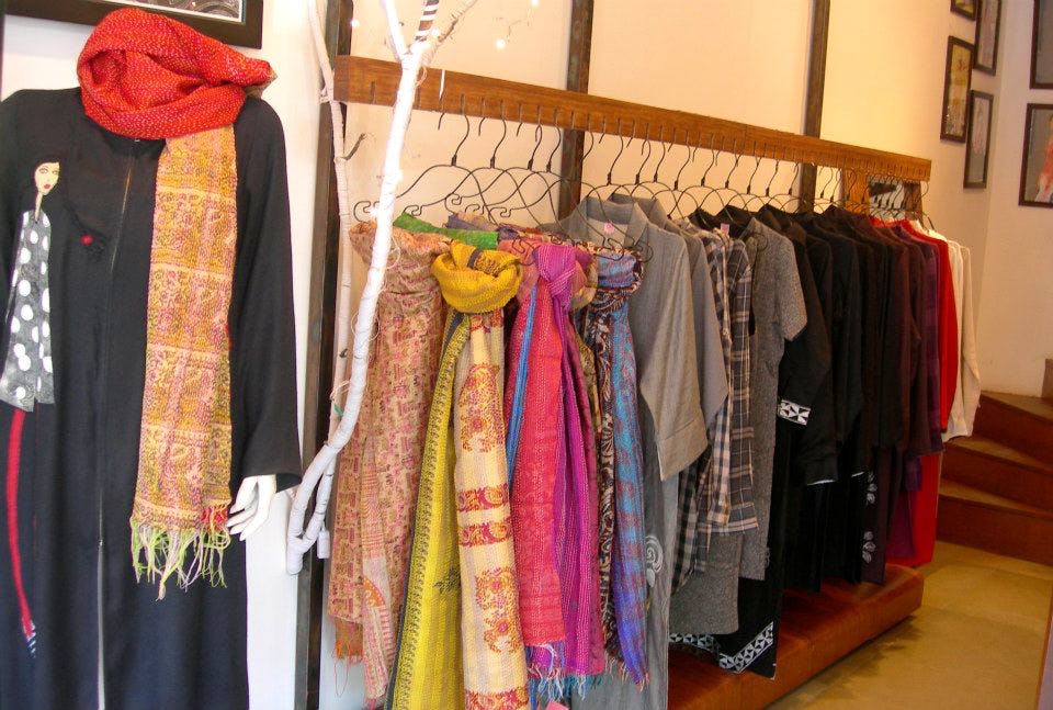 Boutique,Clothes hanger,Clothing,Room,Closet,Textile,Wardrobe,Furniture,Dress,Formal wear