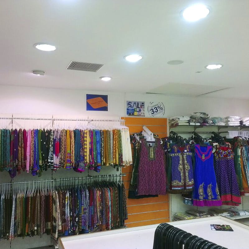 Boutique,Clothing,Room,Outlet store,Textile,Retail,Building,Interior design