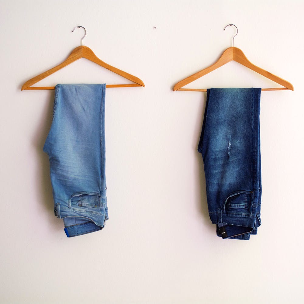 Clothes hanger,Clothing,Blue,Jeans,Denim,Textile,Outerwear,Trousers,Dress,Sleeve