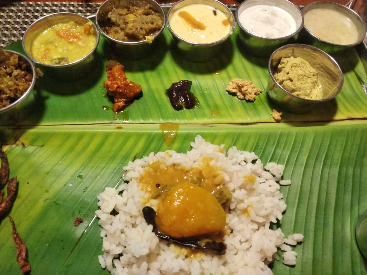 Dish,Food,Cuisine,Sadya,White rice,Banana leaf rice,Steamed rice,Rice,Banana leaf,Ingredient