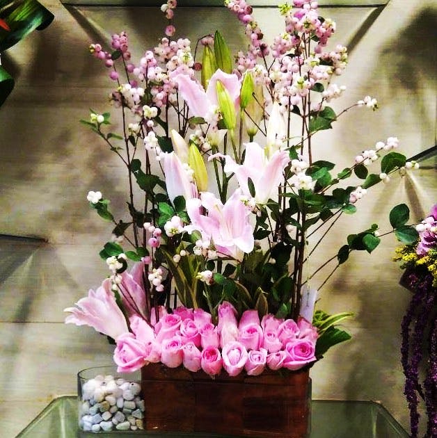 Flower,Floristry,Flower Arranging,Floral design,Plant,Pink,Cut flowers,Artificial flower,Flowering plant,Bouquet