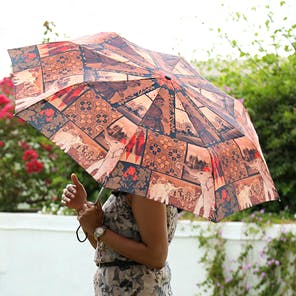 Umbrella,Fashion accessory,Textile,Outerwear,Pattern
