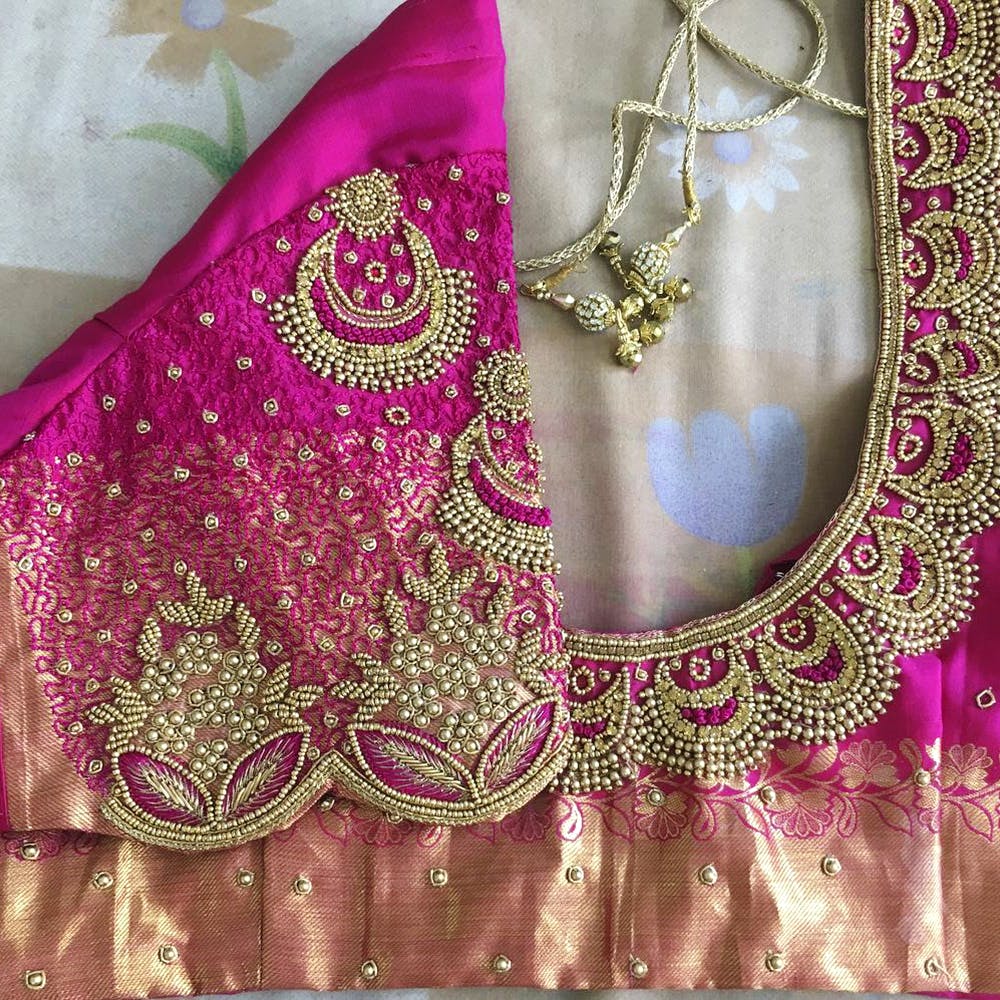 Pink,Magenta,Embroidery,Blouse,Motif,Visual arts,Textile,Design,Pattern,Paisley