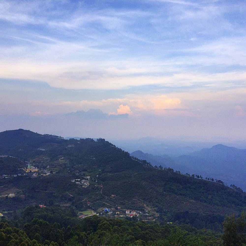 Sky,Mountainous landforms,Hill station,Cloud,Mountain,Atmospheric phenomenon,Hill,Morning,Evening,Natural landscape