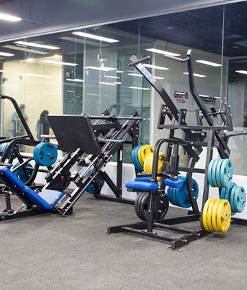 Gym,Exercise equipment,Room,Sport venue,Physical fitness,Machine,Exercise machine,Leisure,Vehicle