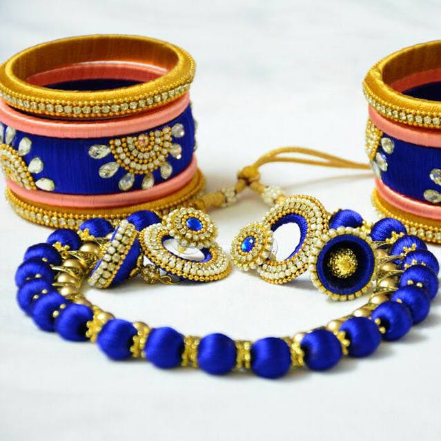Bangle,Jewellery,Cobalt blue,Fashion accessory,Yellow,Bracelet,Gold,Metal,Electric blue,Jewelry making