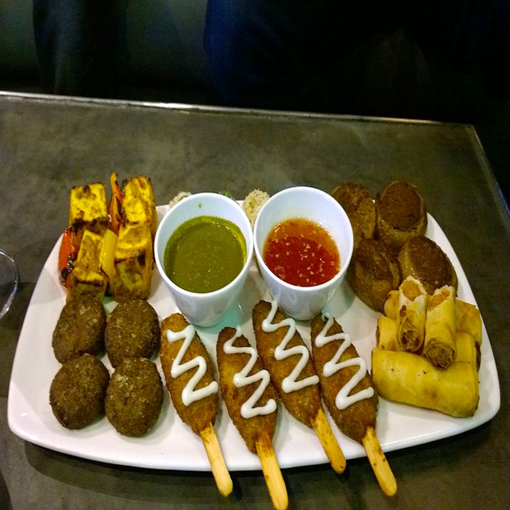 Dish,Food,Cuisine,Ingredient,Corn dog,Satay,Pakora,Fast food,Produce,Pincho