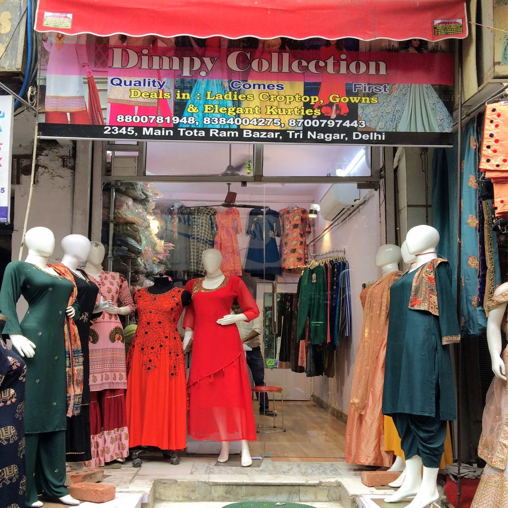 Bazaar,Boutique,Shopping,Display window,Retail,Marketplace,Market,Building,Outerwear,Temple