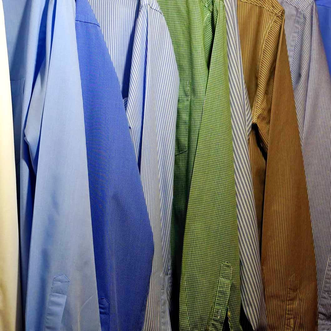 Blue,Green,Textile,Tie,Outerwear,Electric blue,Room,Architecture,Linens,Shirt