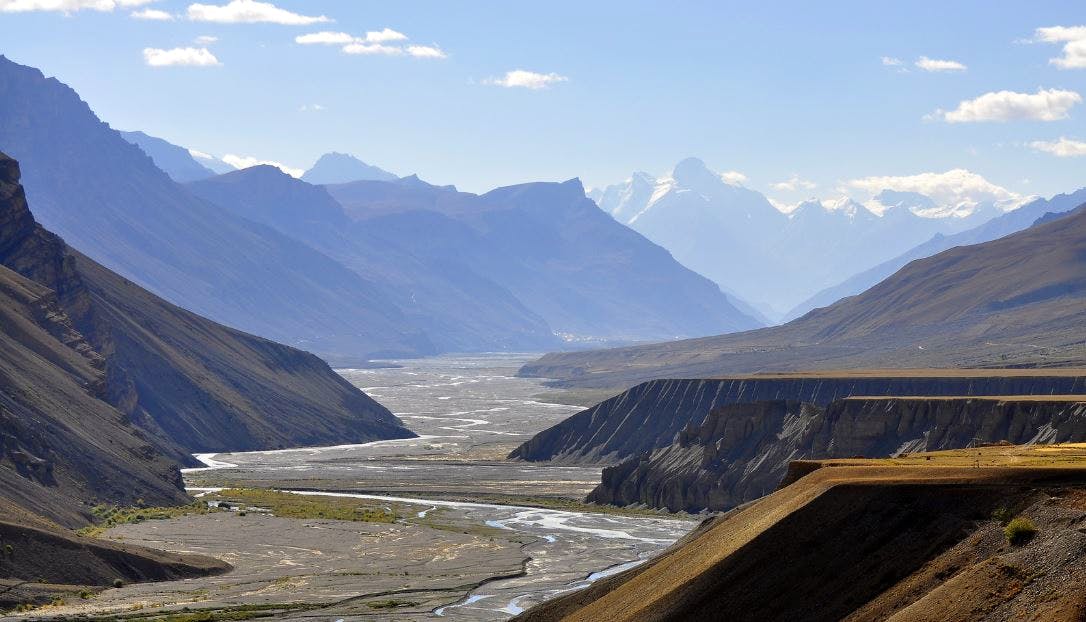 Mountainous landforms,Mountain,Highland,Mountain range,Valley,Ridge,Sky,Natural landscape,Fell,Wilderness