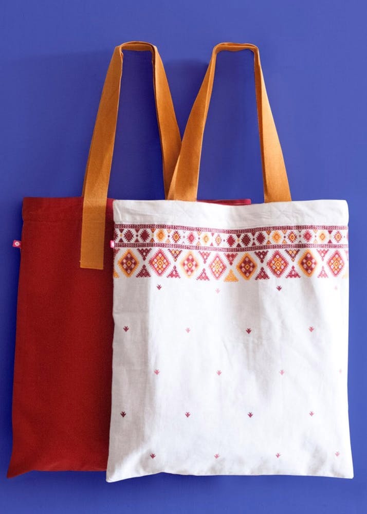 Handbag,Bag,Tote bag,Blue,Product,Fashion accessory,Orange,Shoulder bag,Diaper bag,Material property