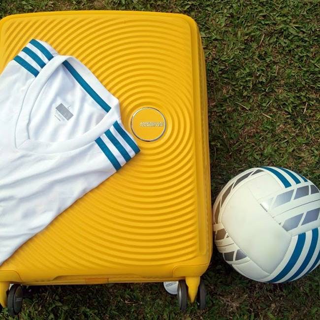 Yellow,Ball,Soccer ball,Inflatable,Sports gear,Football,Sports equipment,Team sport,Games