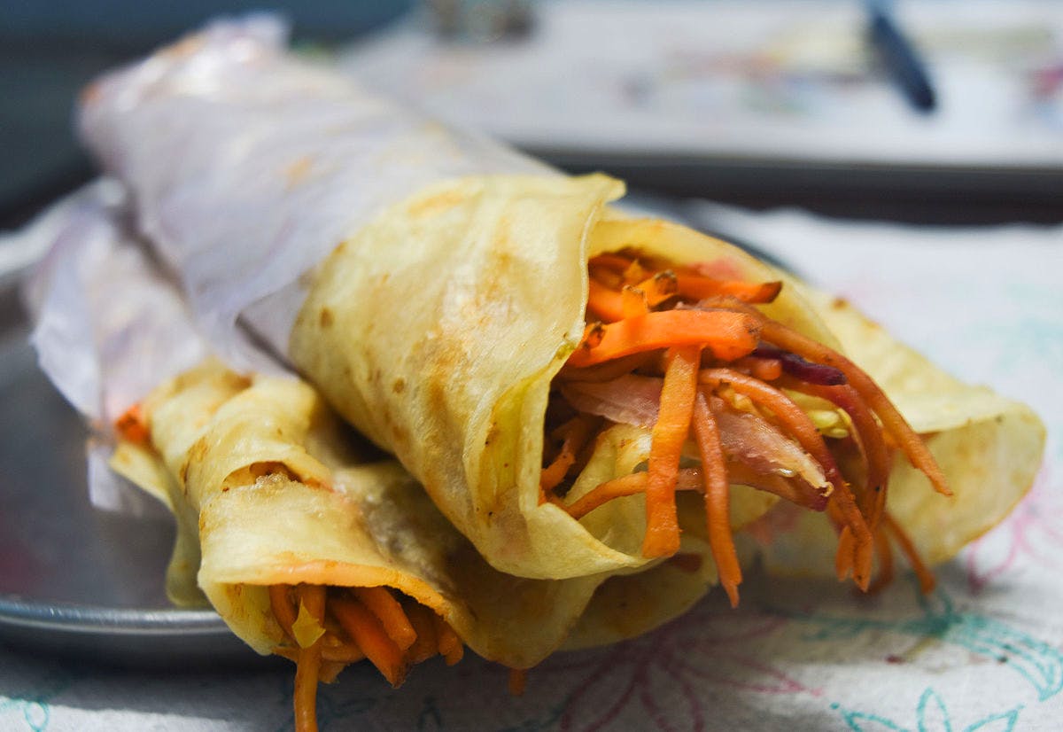 Dish,Food,Cuisine,Taquito,Kati roll,Sandwich wrap,Ingredient,Spring pancake,Popiah,Nem rán