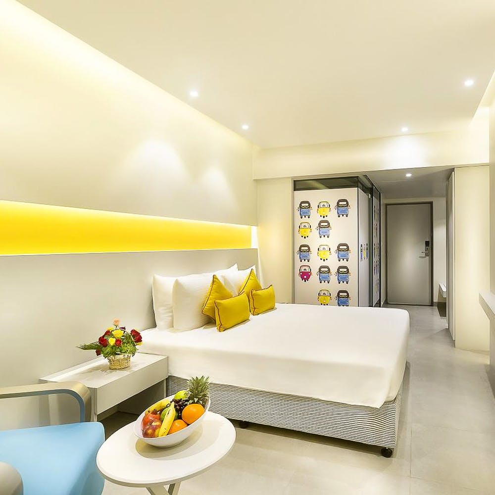 Room,Interior design,Property,Ceiling,Yellow,Furniture,Wall,Building,Bedroom,Living room