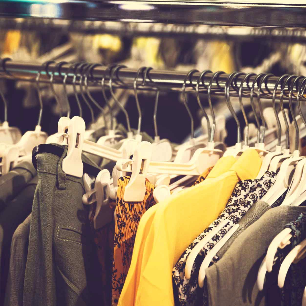 Room,Yellow,Closet,Boutique,Fashion,Footwear,Clothes hanger,T-shirt,Dress,Textile