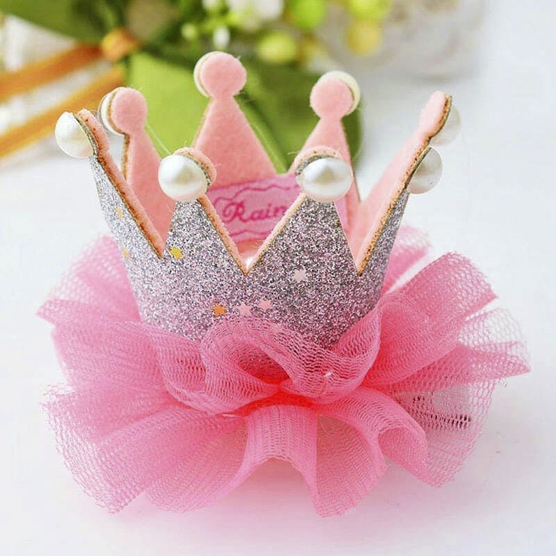 Crown,Pink,Headpiece,Hair accessory,Ballet tutu,Tiara,Costume,Headband,Costume accessory,Hand