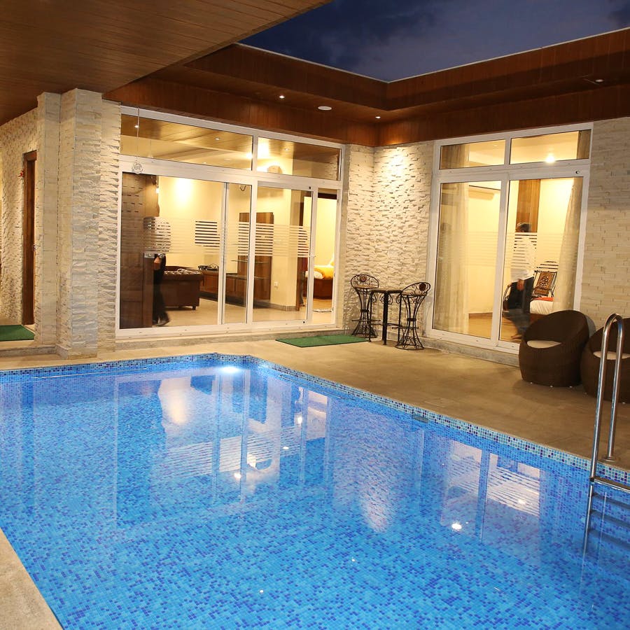 Swimming pool,Property,Building,Real estate,Leisure,Resort,House,Thermae,Hotel,Interior design