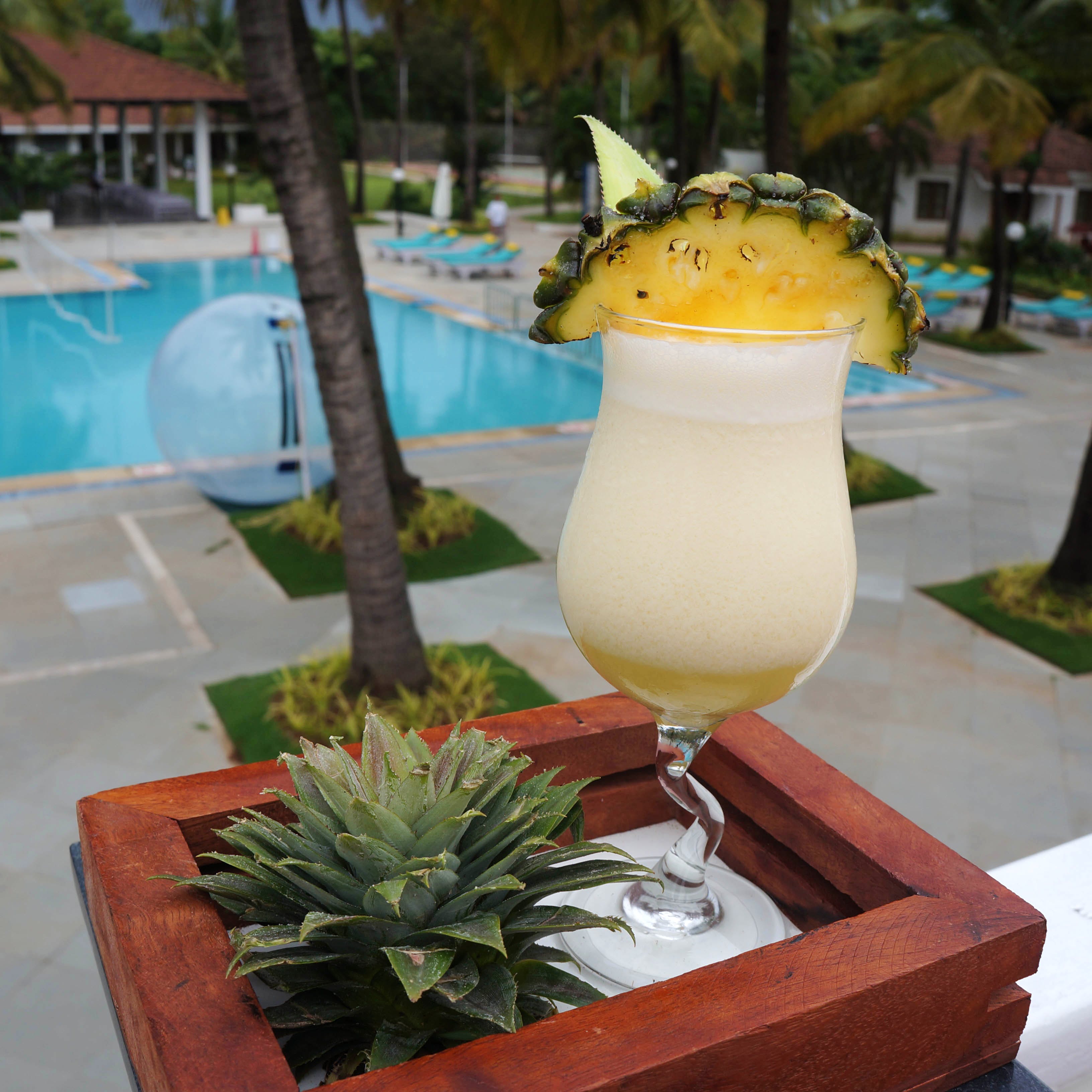 Piña colada,Drink,Alcoholic beverage,Cocktail,Non-alcoholic beverage,Juice,Distilled beverage,Cocktail garnish,Pineapple,Batida