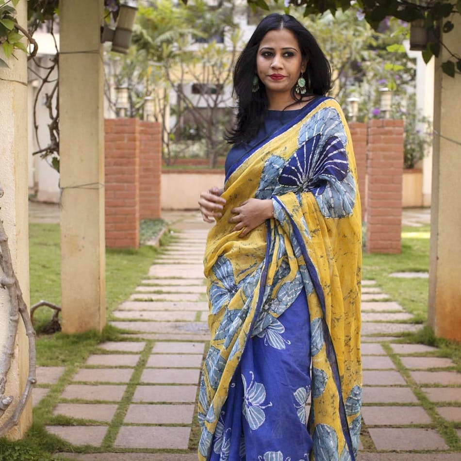 Clothing,Sari,Yellow,Formal wear,Photo shoot,Textile,Photography,Electric blue,Blouse,Long hair