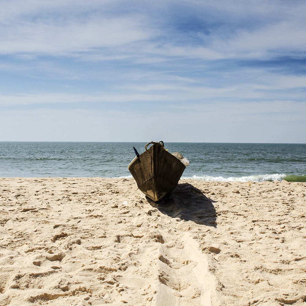 Beach,Sea,Sand,Ocean,Water,Coast,Shore,Rock,Sky,Vacation