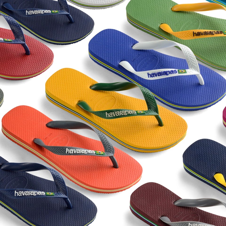 Footwear,Flip-flops,Slipper,Yellow,Shoe,Sandal,Font,Brand,Plimsoll shoe