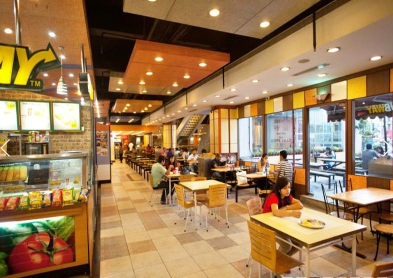 Building,Food court,Restaurant,Café,Fast food restaurant,Interior design,Cafeteria,Fast food,Coffeehouse,Mixed-use