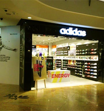 Building,Outlet store,Retail,Footwear,Eyewear,Interior design,Shopping mall,Shoe,Convenience store,Athletic shoe