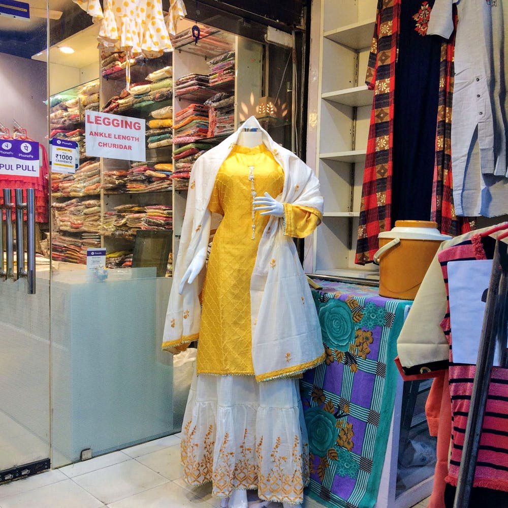 Clothing,Yellow,Snapshot,Boutique,Textile,Shopping,Mannequin,Outerwear,Costume,Retail