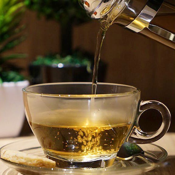 Drink,Cup,Chinese herb tea,Drinkware,Roasted barley tea,Cup,Serveware,Glass,Liqueur,Tableware