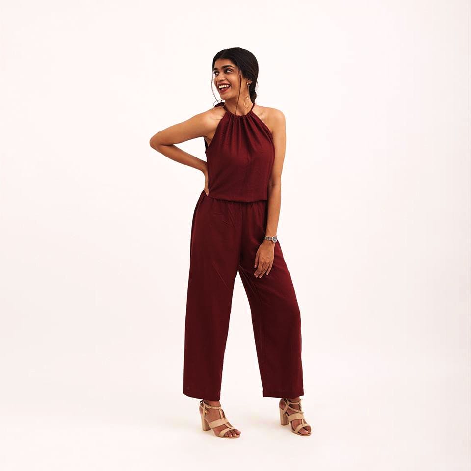 Clothing,Shoulder,Maroon,Waist,Neck,Standing,Trousers,Leg,Joint,Magenta