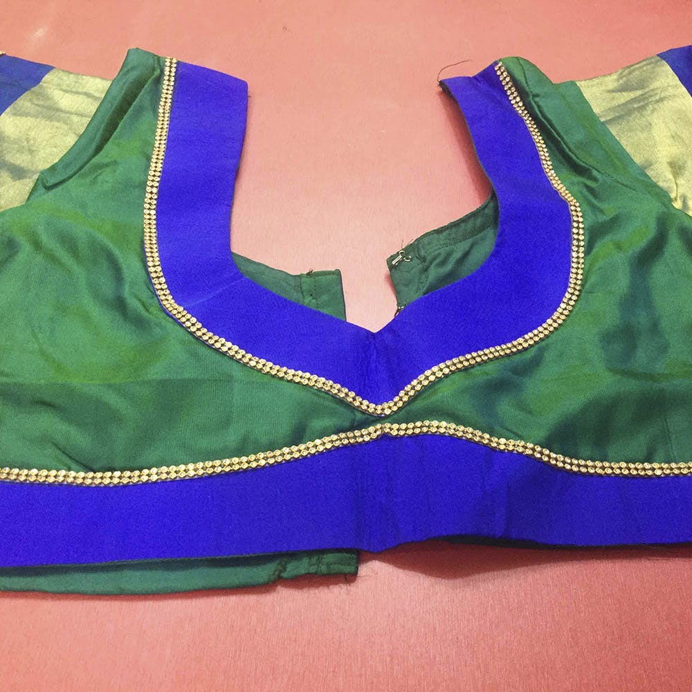 Blue,Green,Clothing,Purple,Aqua,Cobalt blue,Brassiere,Blouse,Violet,Electric blue