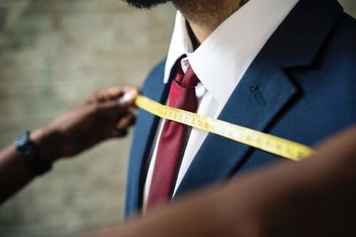 Suit,Hand,Tie,Formal wear,Ceremony,Gentleman