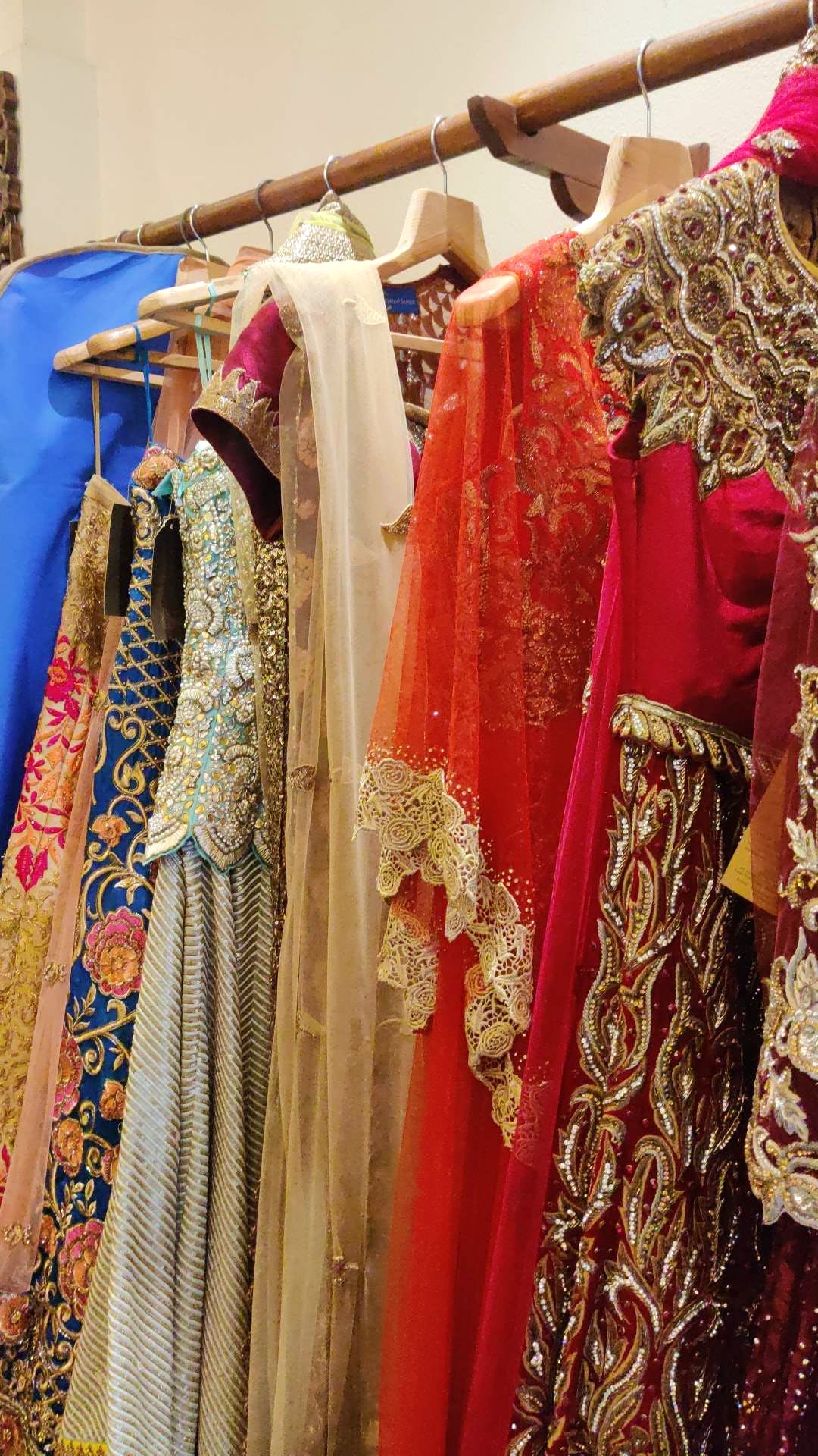 Clothing,Boutique,Public space,Dress,Formal wear,Room,Textile,Tradition,Bazaar,Market