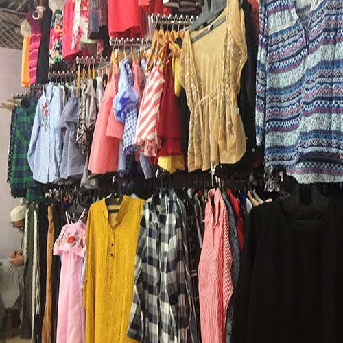 Clothing,Boutique,Selling,Bazaar,Public space,Room,Footwear,Outlet store,Market,Textile