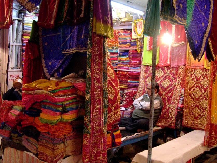 Bazaar,Market,Public space,Textile,Marketplace,Human settlement,City,Room,Thread,Selling