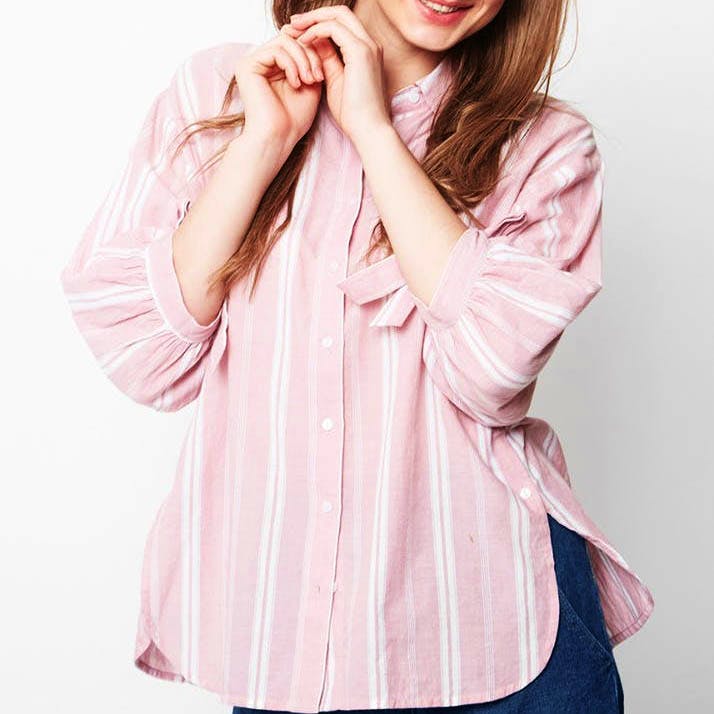 Clothing,Pink,Shoulder,Sleeve,Skin,Neck,Beauty,Peach,Lip,Fashion