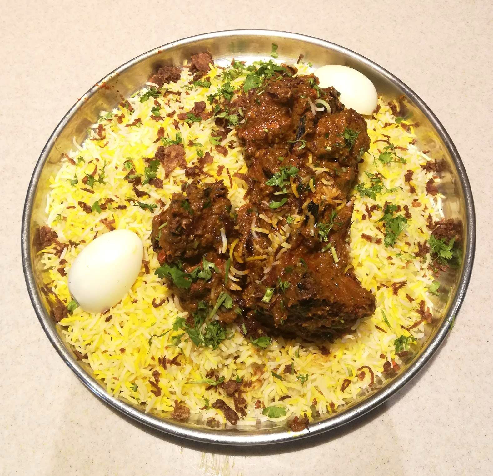 Dish,Cuisine,Food,Ingredient,Biryani,Kabsa,Mandi,Hyderabadi biriyani,Recipe,Produce