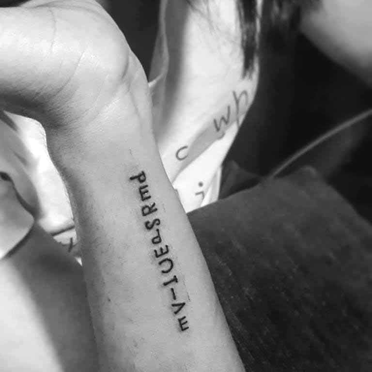 Arm,Temporary tattoo,Tattoo,Skin,Joint,Wrist,Hand,Font,Finger,Human body