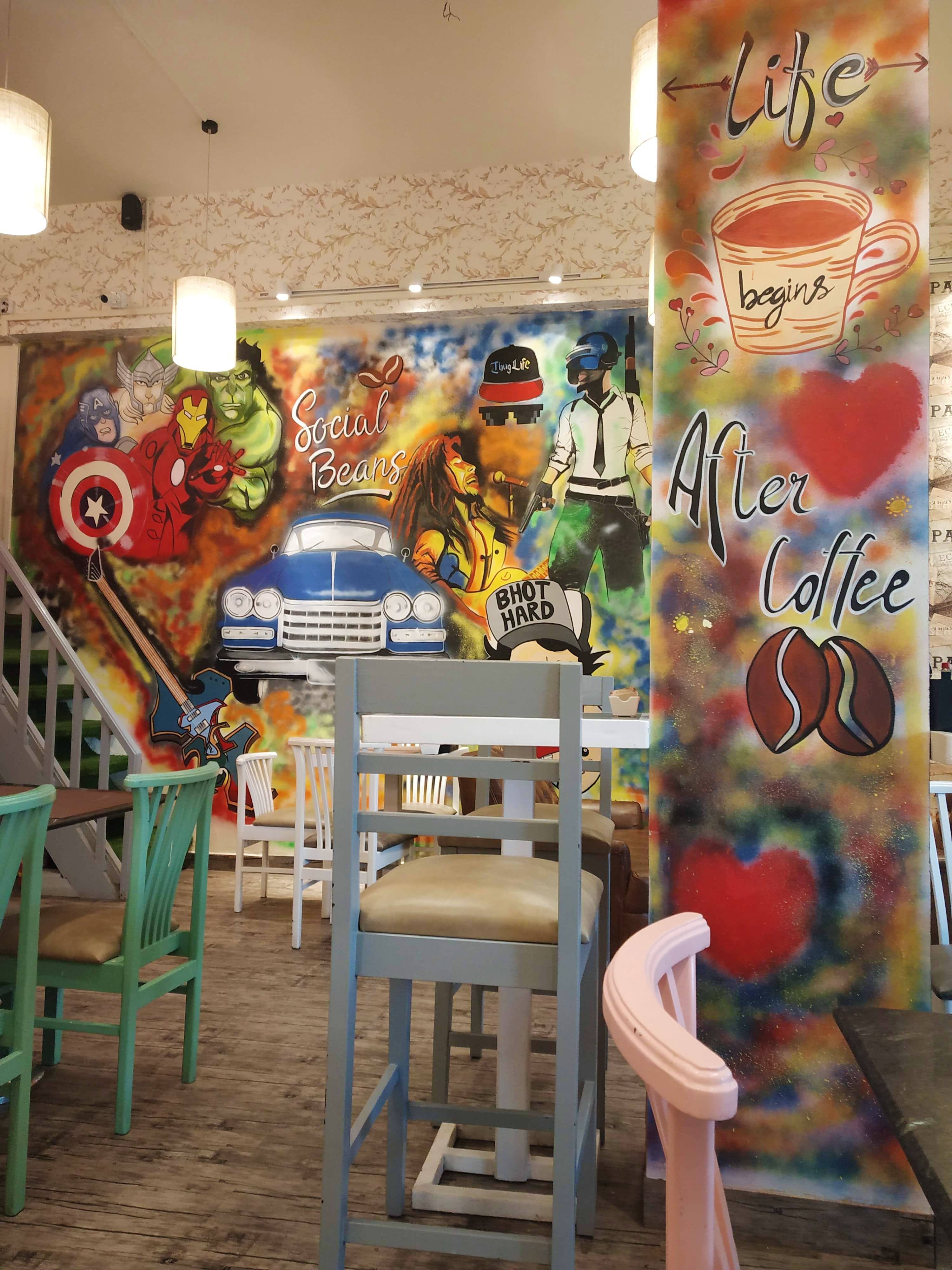 Wall,Art,Interior design,Mural,Street art,Snack,Graffiti,Fast food,Building,Restaurant