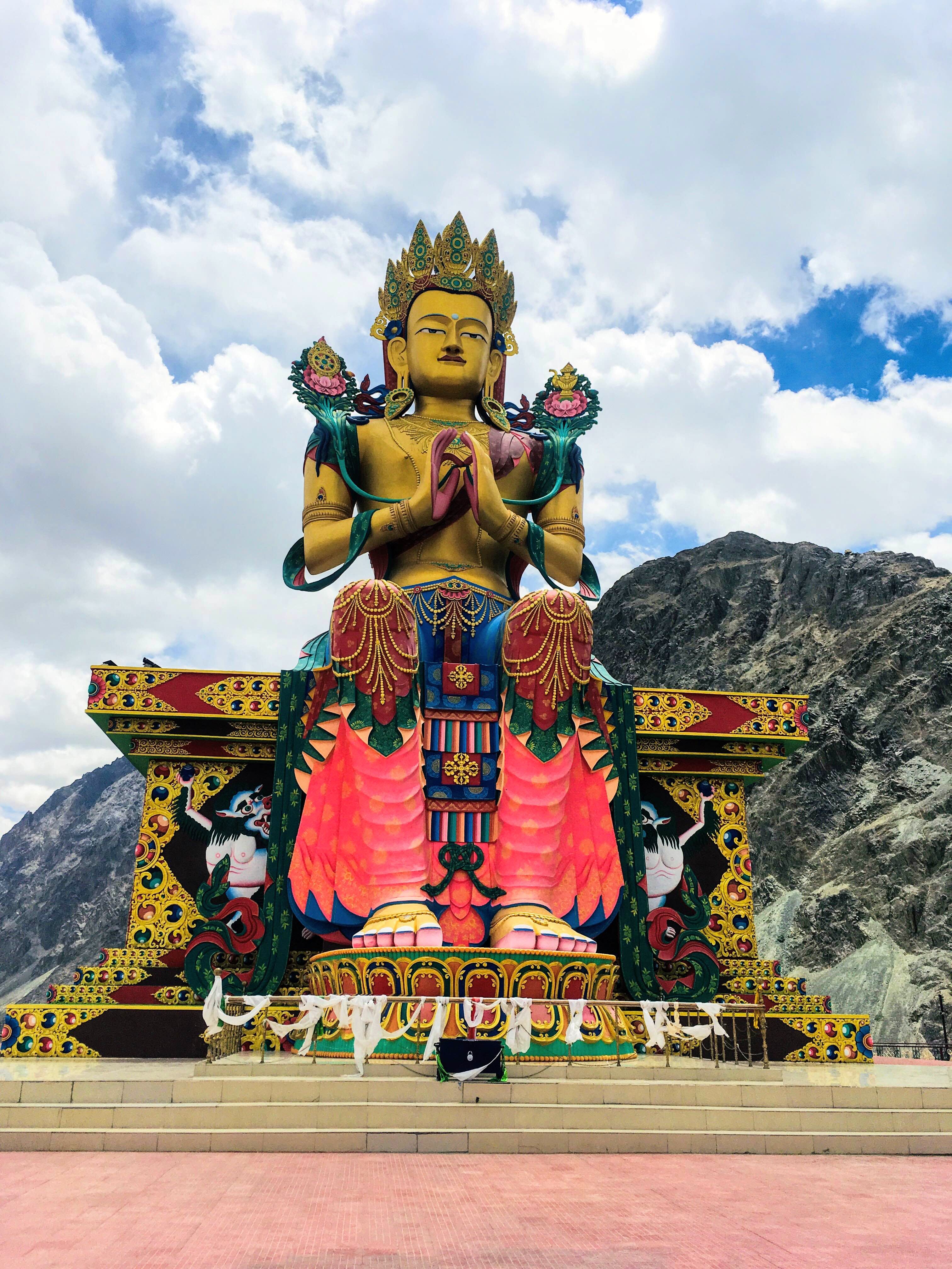 Hindu temple,Temple,Landmark,Place of worship,Statue,Sky,Temple,Tourism,Shrine,Mythology