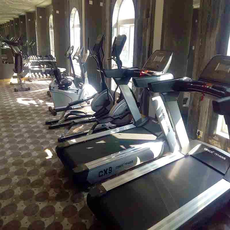 Treadmill,Exercise machine,Exercise equipment,Gym,Room,Sports equipment,Sport venue,Elliptical trainer,Physical fitness