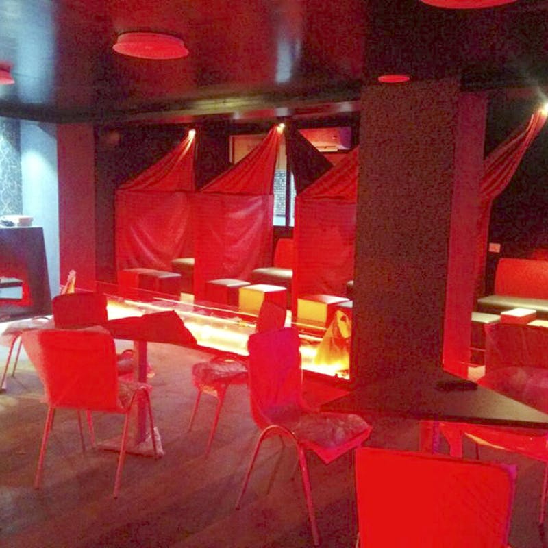 Red,Light,Room,Lighting,Restaurant,Interior design,Design,Table,Bar,Music venue